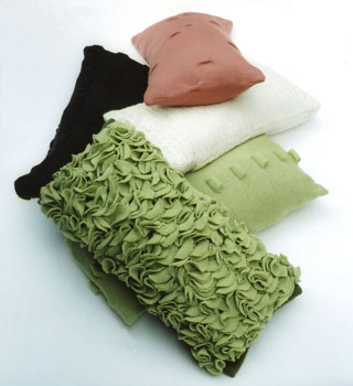 Looolo Textiles cushions are hand-made with certified organic materials and filled with organic buckwheat.